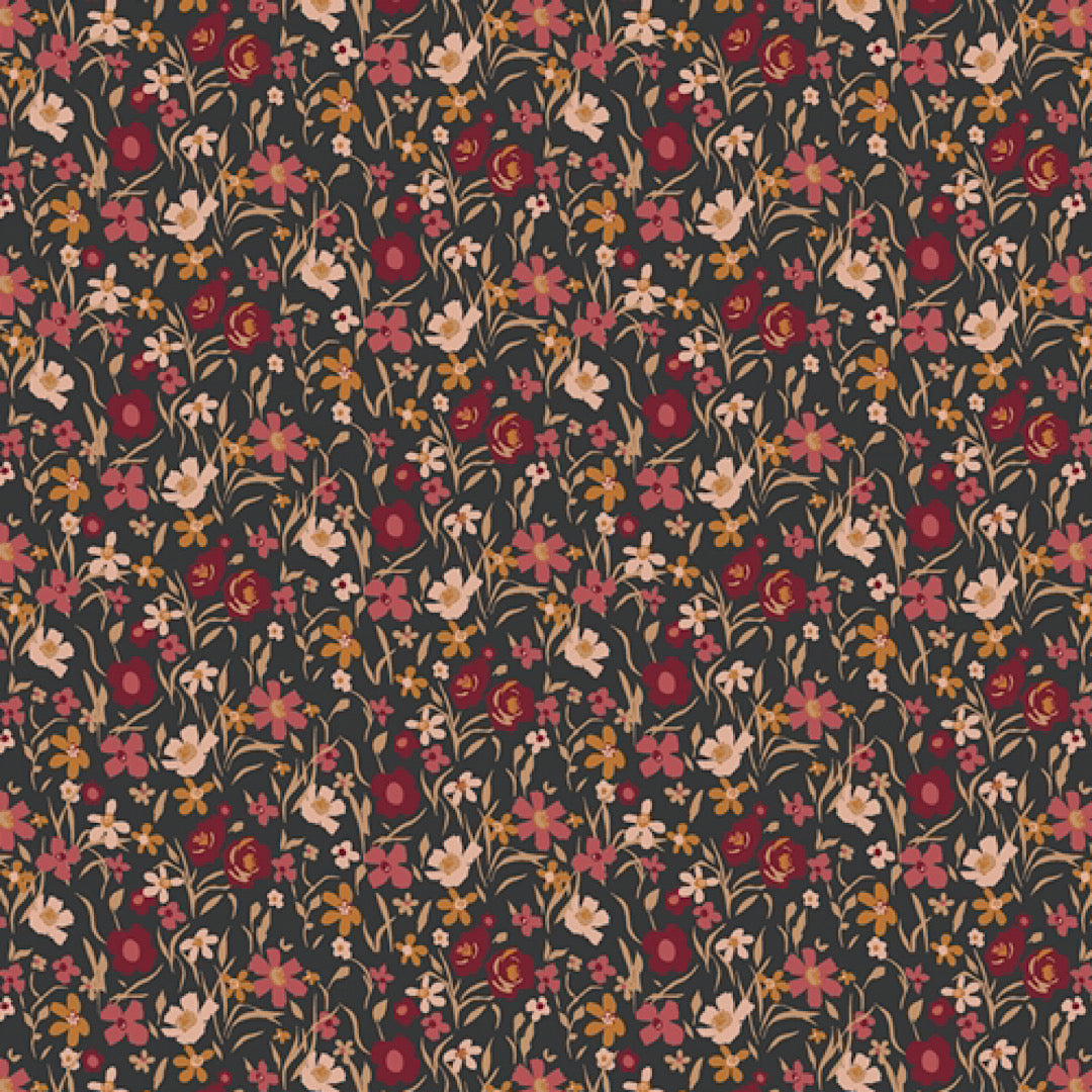 burgundy, gold, and pale pink flowers on a black fabric background