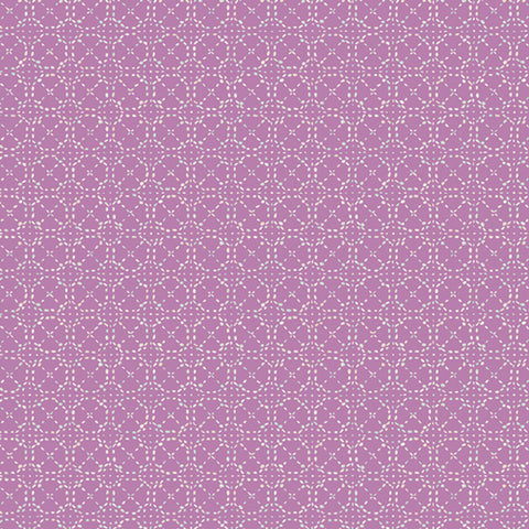 pinkish- purple fabric with tiny teal accents