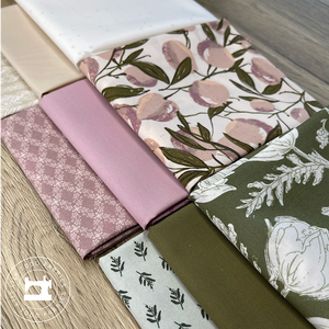 lilac purple, moss green, and beige/white mix of fabrics.