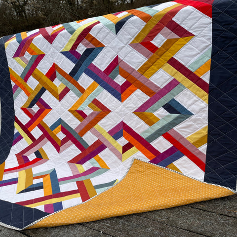 sunset quilt with solid fabrics
